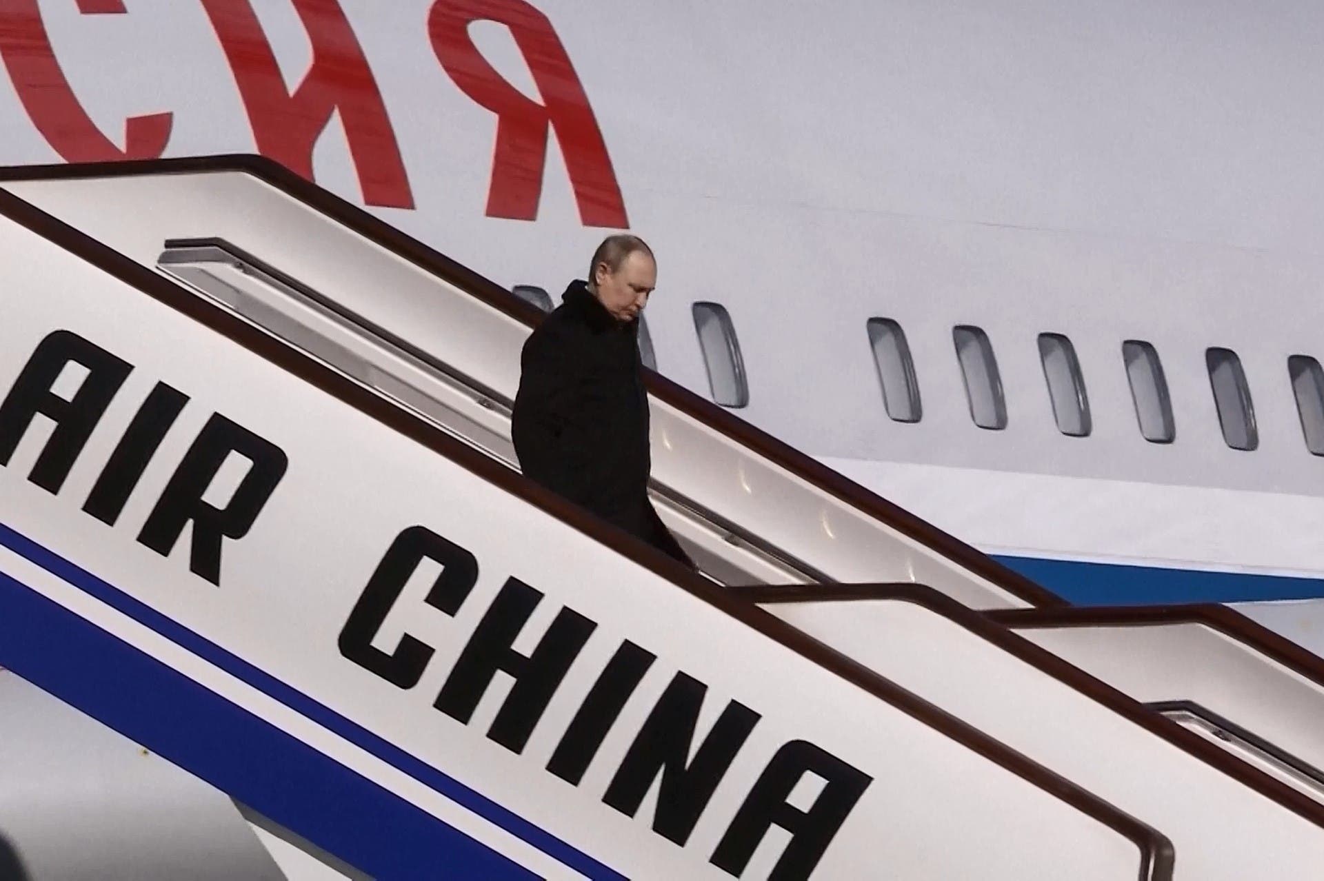 وصول الرئيس الروسي إلى بكين (أ ف ب)