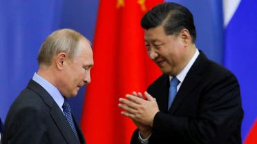 Russian President Vladimir Putin and Chinese President Xi Jinping at Saint Petersburg State University, June 6, 2019. (AFP)
