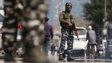 Indian Central Reserve Police Force (CRPF) personnel stand guard on a street in Srinagar, October 12, 2021. (Reuters)