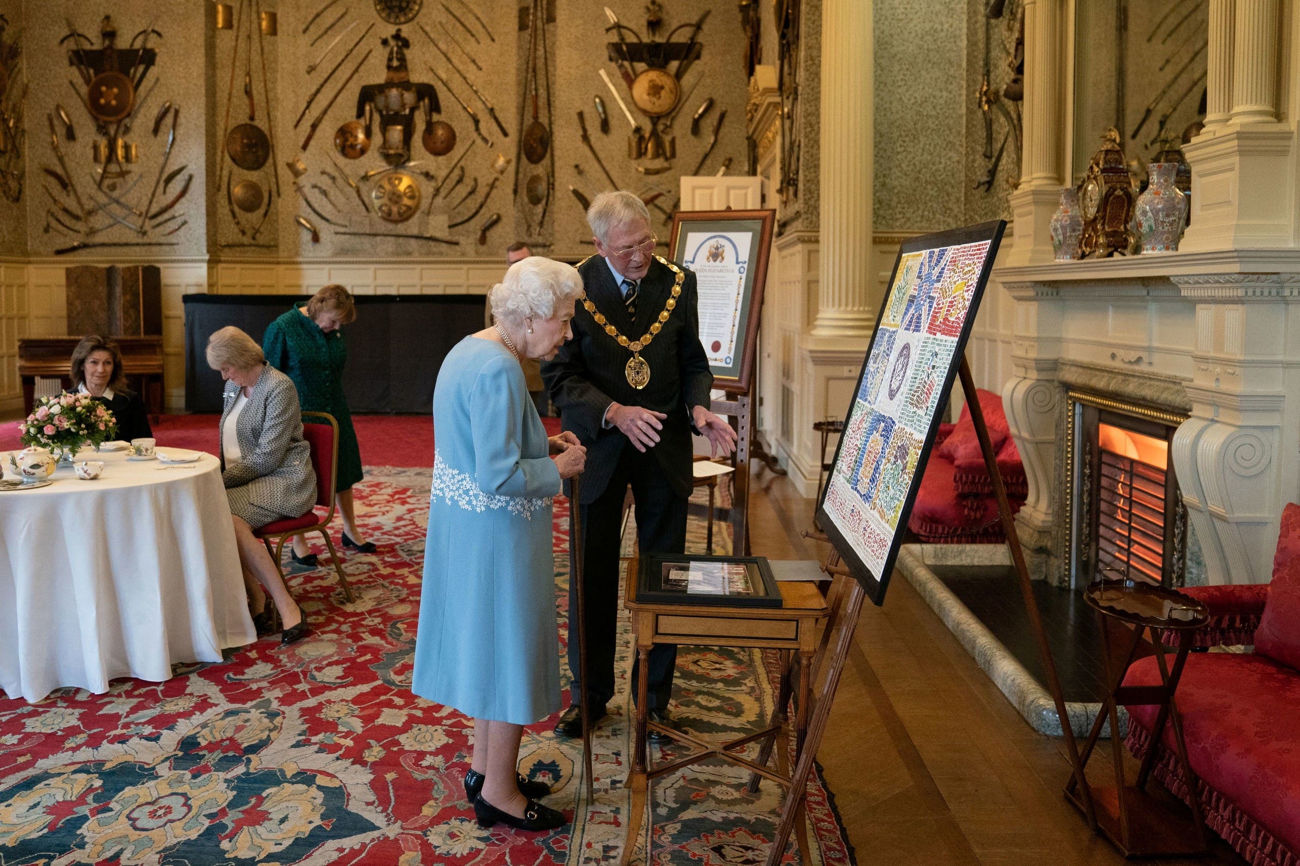 Britain's Queen Elizabeth attends a reception in the Ballroom of Sandringham House which is the Queen's Norfolk residence, with representatives from local community groups to celebrate the start of the Platinum Jubilee, in Sandringham, Britain, February 5, 2022. (Reuters)