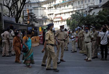 Police stand guard outside the Breach Candy Hospital after the death of singer Lata Mangeshkar in Mumbai, India, on February 6, 2022. (Reuters)