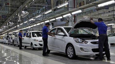 Workers assemble cars inside the Hyundai Motor India Ltd. plant at Kancheepuram district in the southern Indian state of Tamil Nadu. (Reuters)