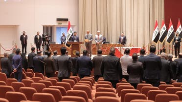 A handout picture released by the Iraqi Prime Minister's Media Office on February 7, 2022 shows a few Iraqi lawmakers attending a scheduled parliament session in Baghdad to choose a new president for Iraq, with most major political blocs boycotting it. (AFP)