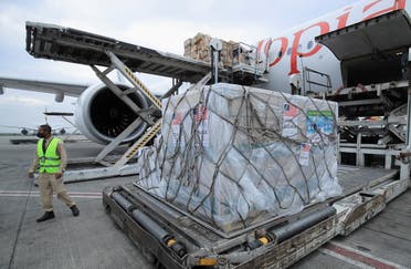 An Ethiopian Airlines Cargo terminal worker offloads a shipment of Johnson & Johnson's coronavirus disease (COVID-19) vaccines that arrived under the COVAX scheme, at the Bole International Airport in Addis Ababa, Ethiopia July 19, 2021. (File photo: Reuters)
