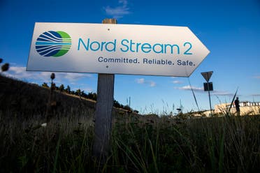 A road sign directs traffic towards the Nord Stream 2 gas line landfall facility entrance in Lubmin, north eastern Germany, on September 7, 2020. (AFP)