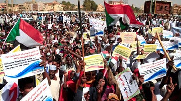 Supporters of the Sudanese army rally outside the office of the United Nations mission, west of Sudan's capital Khartoum, on February 5, 2022.  (AFP)