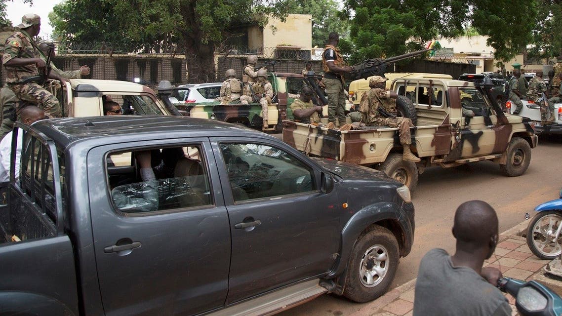 Members of the military junta arrive at the Malian Ministry of Defence in Bamako, Mali, on August 19, 2020, a day after the military arrested Malian president Ibrahim Boubacar Keita and he officially resigned. (AFP)