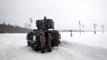 British soldiers take part in a major drill as part of the EFP NATO operation at the Tapa estonian army camp near Rakvere, on February 6, 2022. (AFP)