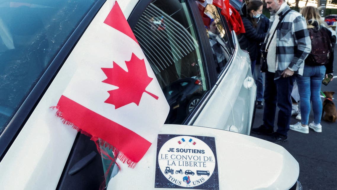A Canadian flag is seen near a sticker reading I support the freedom convoy before the start of their Convoi de la liberte (The Freedom Convoy), a vehicular convoy protest converging on Paris to protest coronavirus disease (COVID-19) vaccine and restrictions in Nice, France, February 9, 2022. (File photo: Reuters)