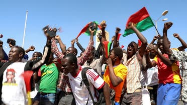 People gather in support of a coup that ousted President Roch Kabore, dissolved government, suspended the constitution and closed borders in Burkina Faso, January 25, 2022. (Reuters)
