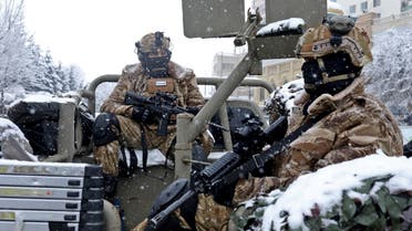 Taliban soldiers are seen during a snowfall in Kabul, Afghanistan, January 22, 2022. REUTERS/Ali Khara