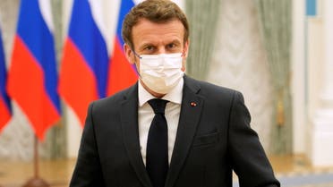French President Emmanuel Macron leaves after attending a joint press conference with Russian President Vladimir Putin (not pictured), in Moscow, Russia, February 7, 2022. (Reuters)