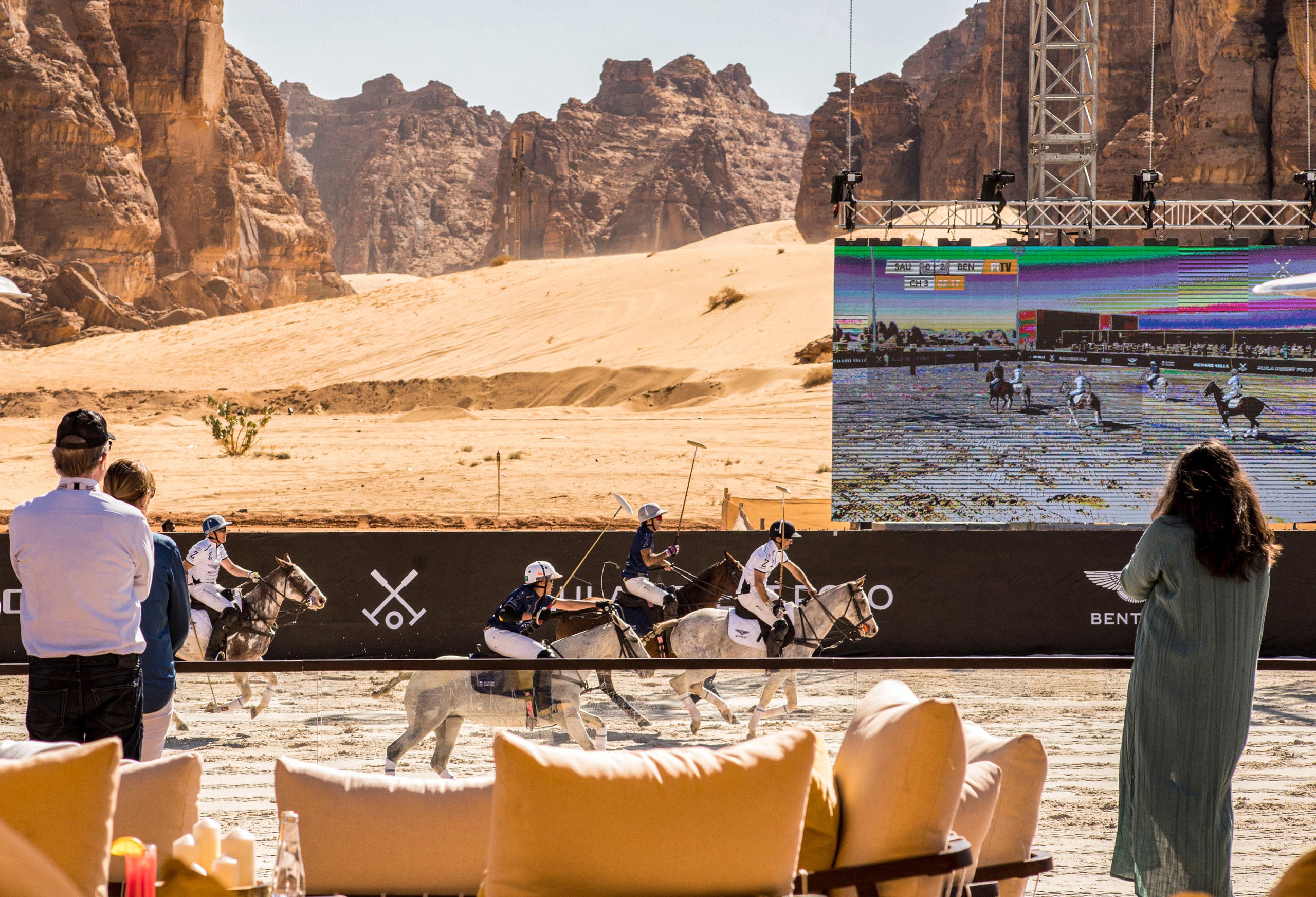 222This handout image provided by AlUla Desert Polo 2022 championship shows spectators watching players during the tournament in Saudi Arabia's northwestern city of al-Ula on February 11, 2022. (AFP)