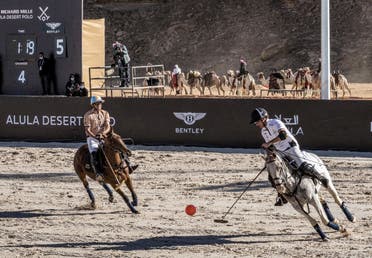 This handout image provided by AlUla Desert Polo 2022 championship shows French entrepreneur, and Polo player Jean-Francois Decaux (R) taking part in the tournament in Saudi Arabia's northwestern city of al-Ula on Febr. (Stock image)
