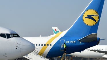 Planes are parked on the tarmac of Boryspil International airport, some 29km from Ukrainian capital of Kyiv on April 2, 2020. Boryspil International airport, the biggest airport of the country, was closed on March 16, 2020, on presidential decision, due to the Covid-19 pandemic caused by the novel coronavirus. (AFP)