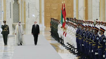 Turkish President Recep Tayyip Erdogan is welcomed by Abu Dhabi's Crown Prince Sheikh Mohammed bin Zayed al-Nahyan in Abu Dhabi, United Arab Emirates February 14, 2022. (Reuters)