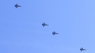 Russian MiG-31K interceptor aircrafts fly over the town of Serpukhov, some 95 km outside Moscow, as they take part in the first rehearsal for the WWII Victory Parade on April 5, 2021. (AFP)