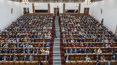 Members of the House of People's Representatives participate in a voting during a session to approve the state of emergency declared by the Prime Minister, in Addis Ababa, Ethiopia, on November 4, 2021. (AFP)
