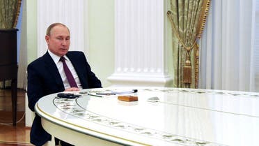 Russian President Vladimir Putin attends a meeting with German Chancellor Olaf Scholz in Moscow, Russia, on February 15, 2022. (Reuters) 
