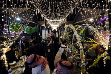 Visitors shop at businesses owned by Saudi women in Dammam, Saudi Arabia, February 22, 2019. (Reuters)