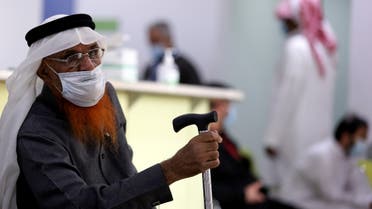 A person waits to receive a vaccine against the coronavirus disease (COVID-19), at Prince Sultan Complex Health Center, in Riyadh, Saudi Arabia, January 13, 2022. (Reuters)