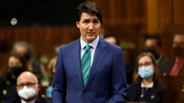 Canada's Prime Minister Justin Trudeau speaks in the House of Commons about the implementation of the Emergencies Act as truckers and their supporters continue to protest against coronavirus disease (COVID-19) vaccine mandates in Ottawa, Ontario, Canada, February 17, 2022. (Reuters)