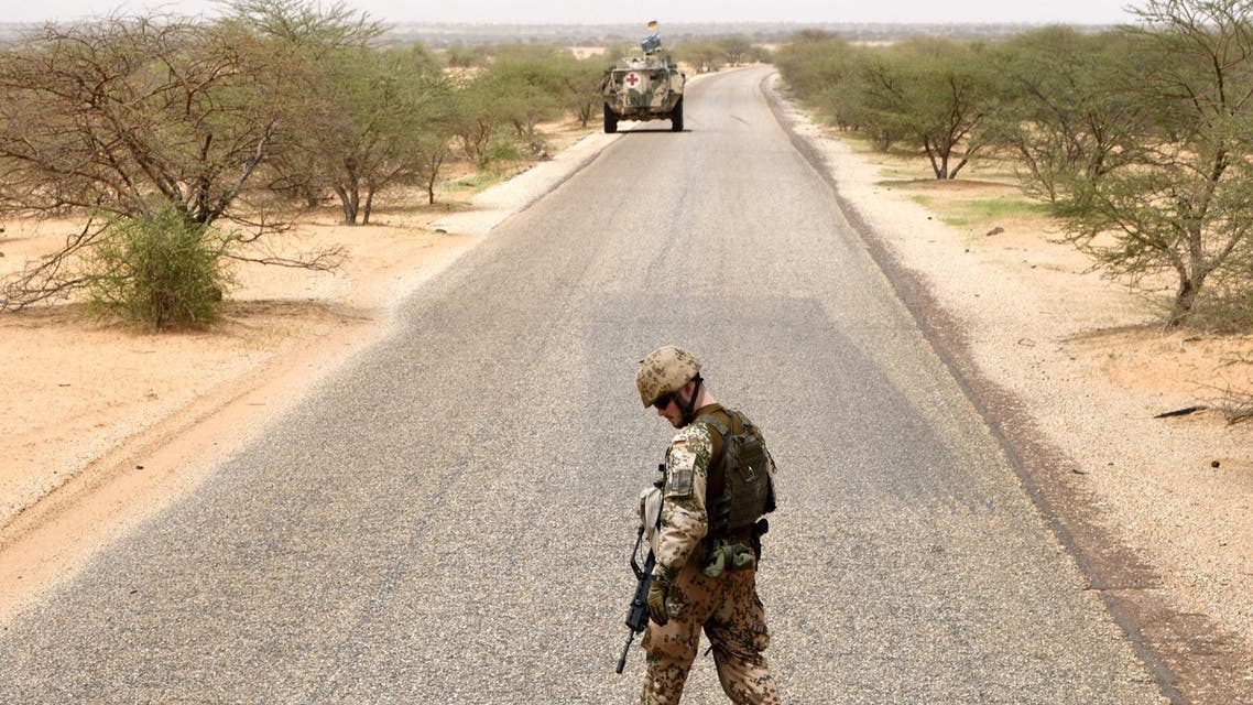 This file photo taken on August 2, 2018 shows a German soldier from the parachutists detachment of the MINUSMA (United Nations Multidimensional Integrated Stabilization Mission in Mali) searching for IED (improvised explosive device) during a patrol on the route from Gao to Gossi, Mali. (AFP)