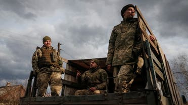 Ukrainian service members are seen on the front line near the village of Zaitseve in the Donetsk region, Ukraine February 19, 2022. REUTERS/Gleb Garanich