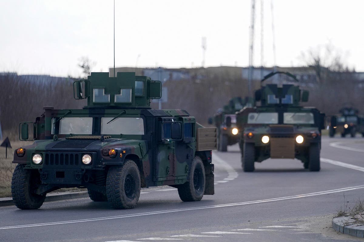 An armoured convoy of U.S. Army soldiers assigned to the 82nd Airborne Division, deployed to Poland to reassure NATO Allies and deter Russian aggression, arrives at an operating base near Mielec, Poland, on February 18, 2022. (File photo: Reuters)