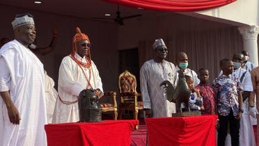 The Oba of Benin Kingdom, Oba Ewuare II receives two stolen Benin artifacts returned from England after 125 years in Benin, Nigeria, on February 19, 2022. (Reuters)