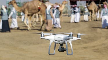 A picture taken on February 8, 2017 shows a camera-equipped drone flying at the Suwahan heritage festival in Al-Ain on the outskirts of the Emirati capital Abu Dhabi. (AFP)