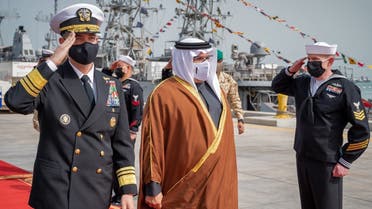 Bahrain’s Crown Prince Salman bin Hamad al-Khalifa and US Navy Central Command Vice Adm. Brad Cooper at the pier at Naval Support Activity (NSA) Bahrain, Jan. 31, 2022. (AFP)