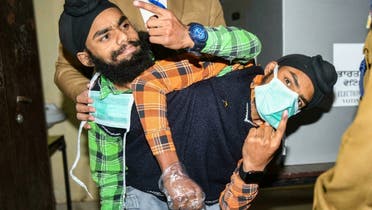 Sohan and Mohan Singh, 19, are joined at the hip and share several organs as well as legs. (AFP)