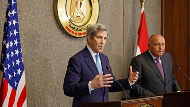 Egypt’s Foreign Minister Sameh Shoukri and the US climate envoy John Kerry in Cairo, Feb. 21, 2022. (AFP)