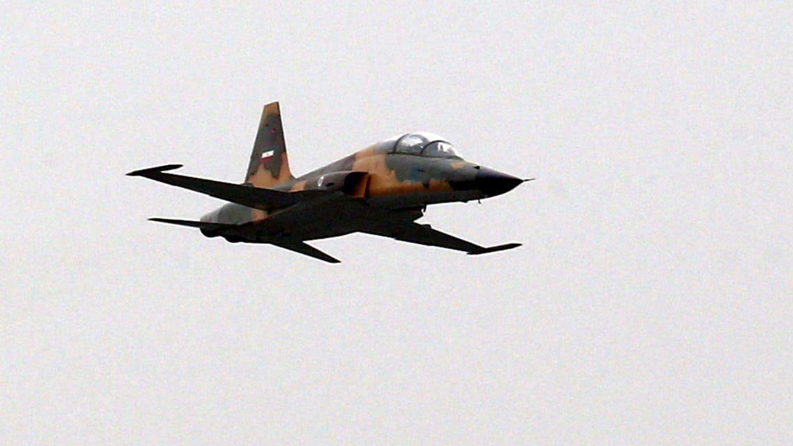 An Iranian fighter jet HESA Kowsar, a fourth-generation fighter, is seen during it's first public flight as part of a military parade during a ceremony marking the country's annual army day in Tehran, on April 18, 2019. Iran's President Hassan Rouhani called on Middle East states on April 18 to drive back Zionism, in an Army Day tirade against the Islamic republic's archfoe Israel. Speaking flanked by top general as troops paraded in a show of might, Rouhani also sought to reassure the region that the weaponry on display was for defensive purposes and not a threat. / AFP / stringer