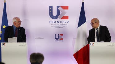 High Representative of the European Union for Foreign Affairs and Security Policy Josep Borrell (L) looks at France's European and Foreign Affairs Minister Jean-Yves Le Drian during a joint press conference about the situation between Ukraine and Russia, in Paris on February 22, 2022. (AFP)
