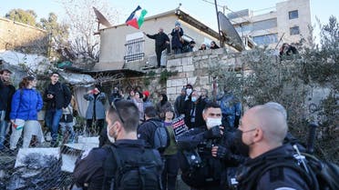 Israeli security forces deploy as Palestinian, Israeli, and foreign activists demonstrate around the Salem family home during a protest in the east Jerusalem neighborhood of Sheikh Jarrah, on January 21, 2022. (AFP)