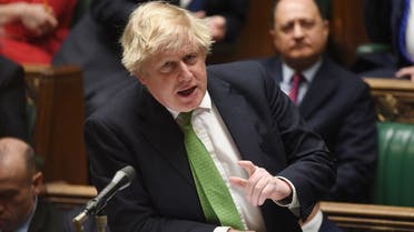 A handout photograph released by the UK Parliament shows Britain's Prime Minister Boris Johnson speaking as he updates MPs on the situation between Ukraine and Russia in the House of Commons, in London, on February 22, 2022. (AFP)