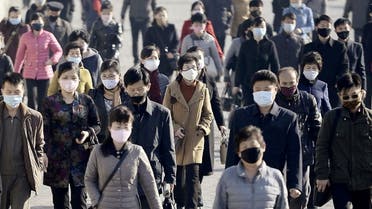 People wearing protective face masks commute amid concerns over the new coronavirus disease (COVID-19) in Pyongyang, North Korea March 30, 2020, in this photo released by Kyodo. Picture taken March 30, 2020. (File photo: Reuters)