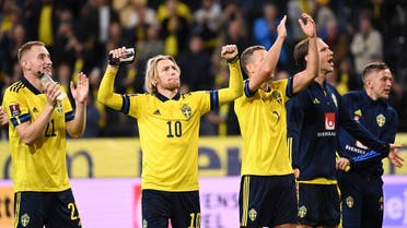 Sweden's midfielder Emil Forsberg (2nd,L) and team mates acknowledge fans after their 2-1 win in the FIFA World Cup Qatar 2022 qualification Group B football match between Sweden and Spain, at the Friends Arena in Solna, Sweden on September 2, 2021. (AFP)