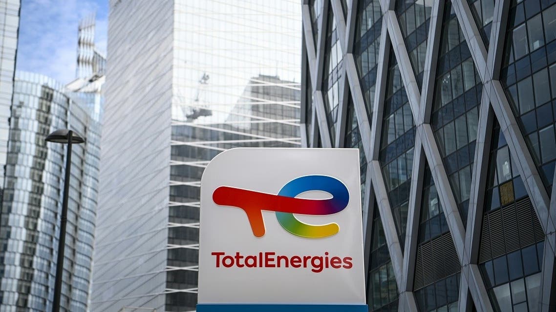 This file photo taken on May 28, 2021 shows the new TotalEnergies logo during its unveling ceremony, at a charging station in La Defense on the outskirts of Paris. (AFP)