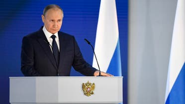 n this file photo taken on April 21, 2021 Russian President Vladimir Putin delivers his annual state of the nation address at The Federal Assembly at The Manezh Exhibition Hall in Moscow. (AFP)