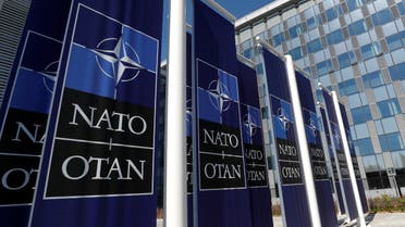 Banners displaying the NATO logo are placed at the entrance of new NATO headquarters during the move to the new building, in Brussels, Belgium April 19, 2018. (File photo: Reuters)