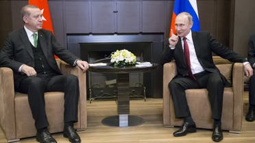 FILE PHOTO: Russian President Vladimir Putin (R) meets with his Turkish counterpart Tayyip Erdogan in Sochi, Russia, May 3, 2017. REUTERS/Alexander Zemlianichenko/Pool/File Photo