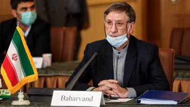 Mohsen Baharvand, Iran's deputy minister for international and legal affairs, meets with members of the Ukrainian delegation in the second round of talks on compensation for the families of victims of the Ukraine International Airlines Flight 752 crash, in Iran's capital Tehran on October 19, 2020. (AFP)