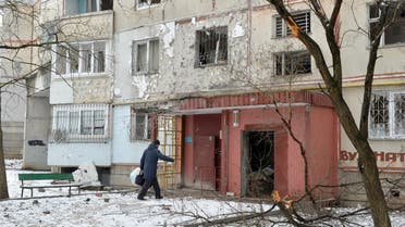 A view of a residential building damaged by recent shelling in Kharkiv on February 26, 2022. (AFP)