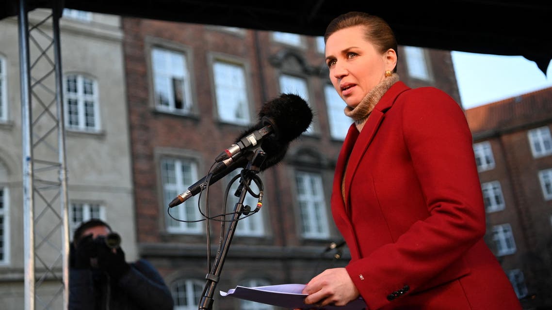 Danish Prime Minister Mette Frederiksen talks to the crowd (estimated to 10,000 people), as she participates in a protest demonstration in front of the Russian Embassy in Copenhagen, Denmark, February 27, 2022. (Reuters)