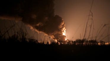 A view shows a burning oil depot reportedly hit by shelling near the military airbase Vasylkiv in the Kyiv region, Ukraine, on February 27, 2022. (Reuters)