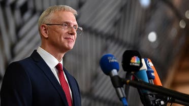 Latvia's Prime Minister Krisjanis Karins speaks to the press as he arrives for an emergency European Union (EU) summit at The European Council Building, on the situation in Ukraine after Russia launched an invasion in Brussels, Belgium, on February 24, 2022. (Reuters)