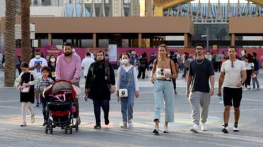 People visit the Dubai Expo 2020 on February 28, 2022 as the UAE drops mandatory wearing of face masks in outside areas, the most significant easing of Covid-19 restrictions since April 2020, when the pandemic spread across the globe. (AFP)